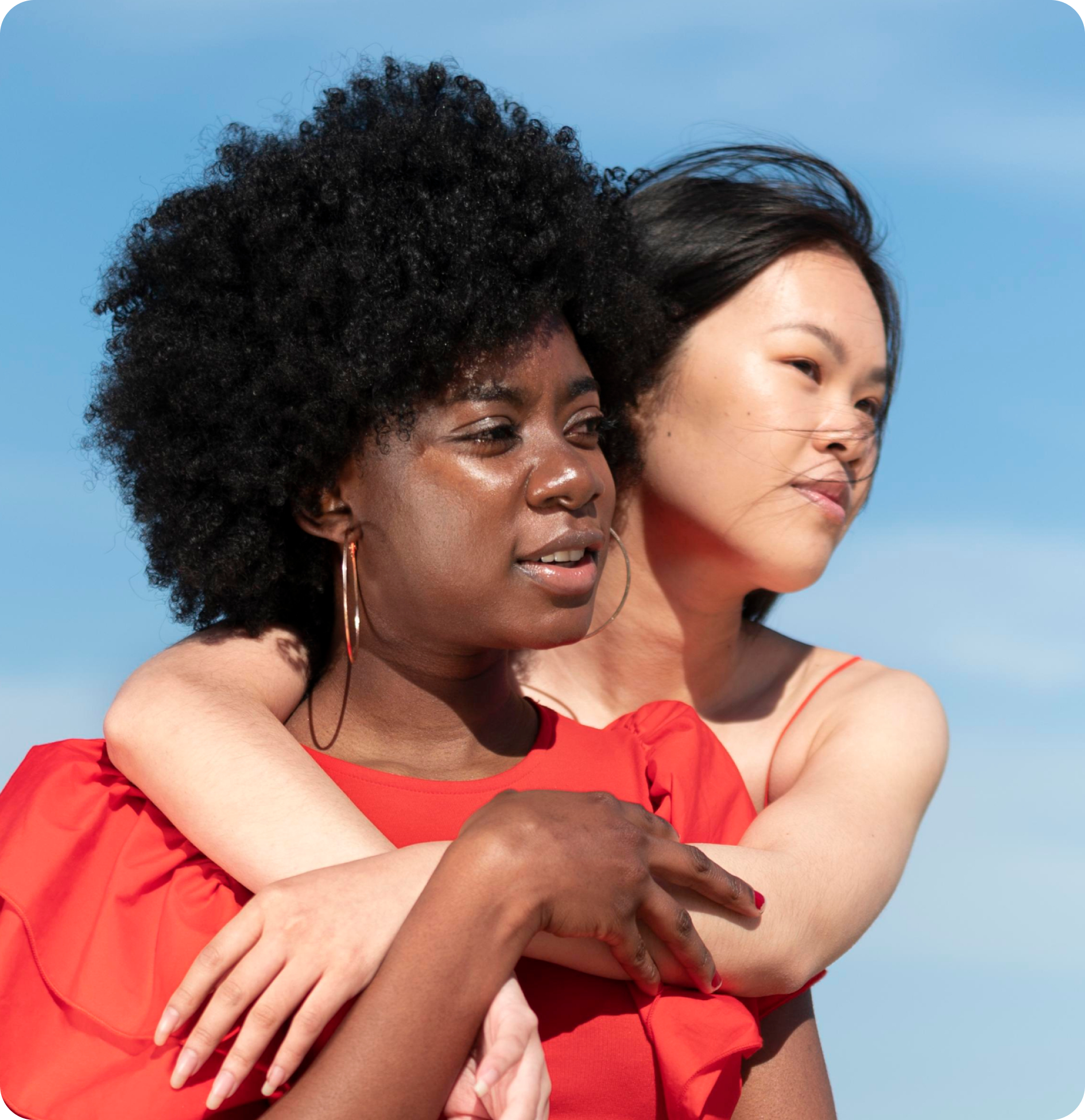 Two women, one black and one asian